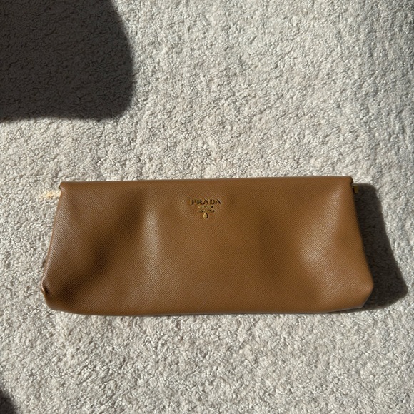 Prada Handbags - Prada Tan Leather Pouch with Gold Logo